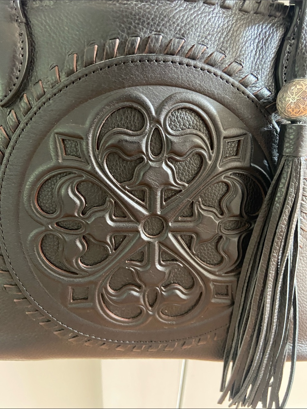 Brighton Black Leather Tote with Embossed Medallion and Tassel - Picture 2 of 15
